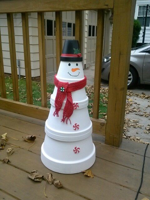 Charming Terra Cotta Snowman Tower