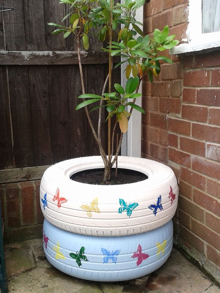 Butterfly-Adorned Tire Planters for Gardens