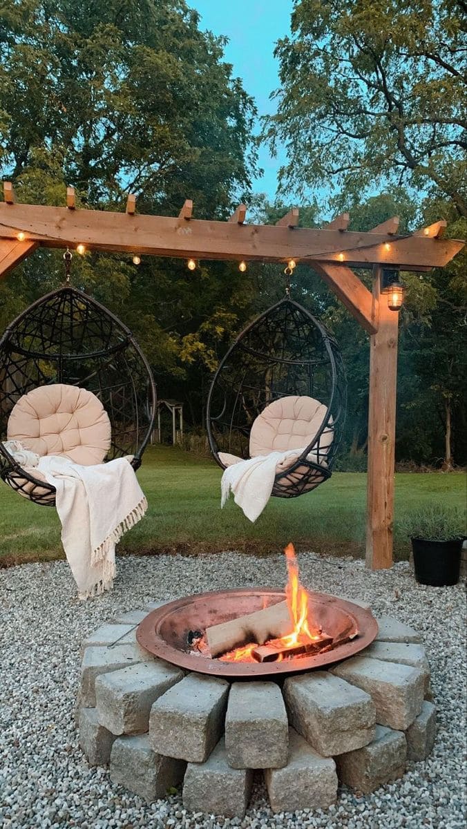 Cozy Backyard Fire Pit with Hanging Chairs