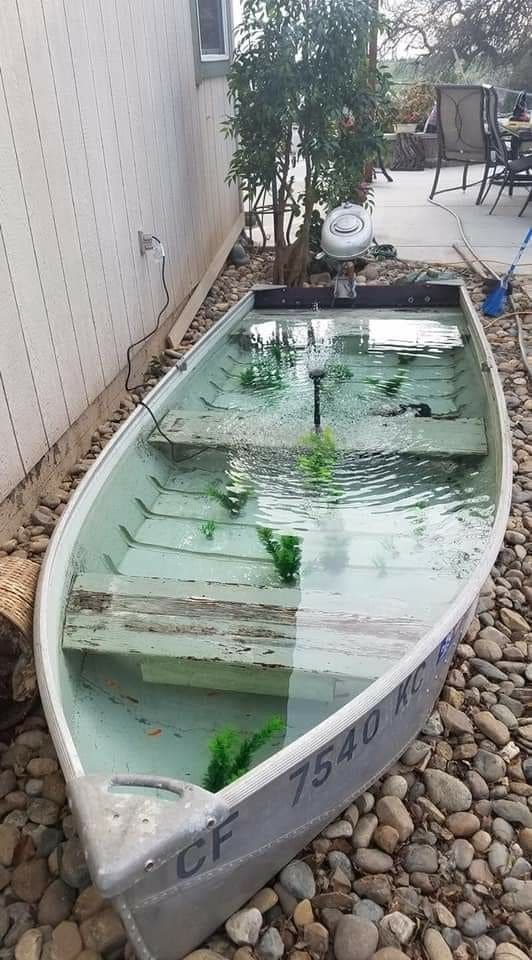 Creative Boat Fountain for Backyard Serenity