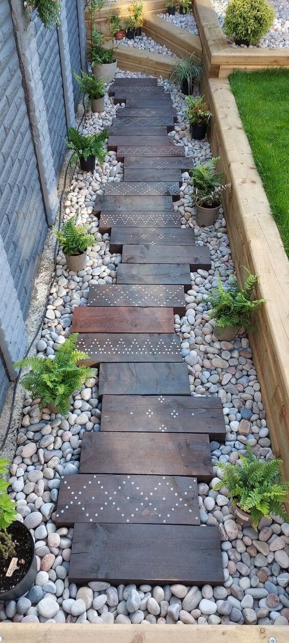 Elegant Pebble Pathway with Wooden Charm