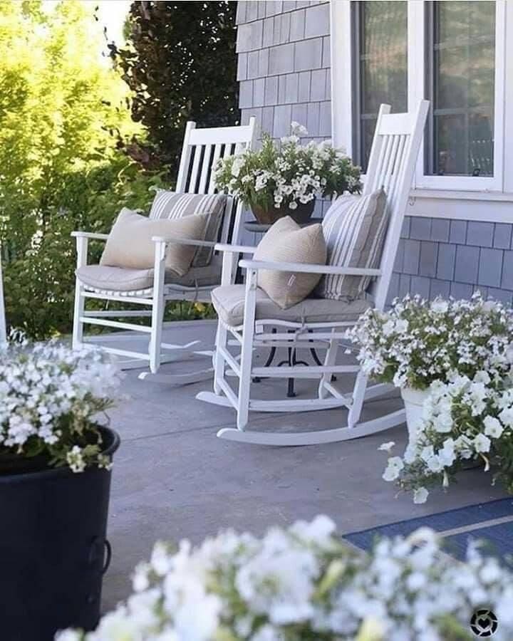 Elegant White Porch with Floral Bliss