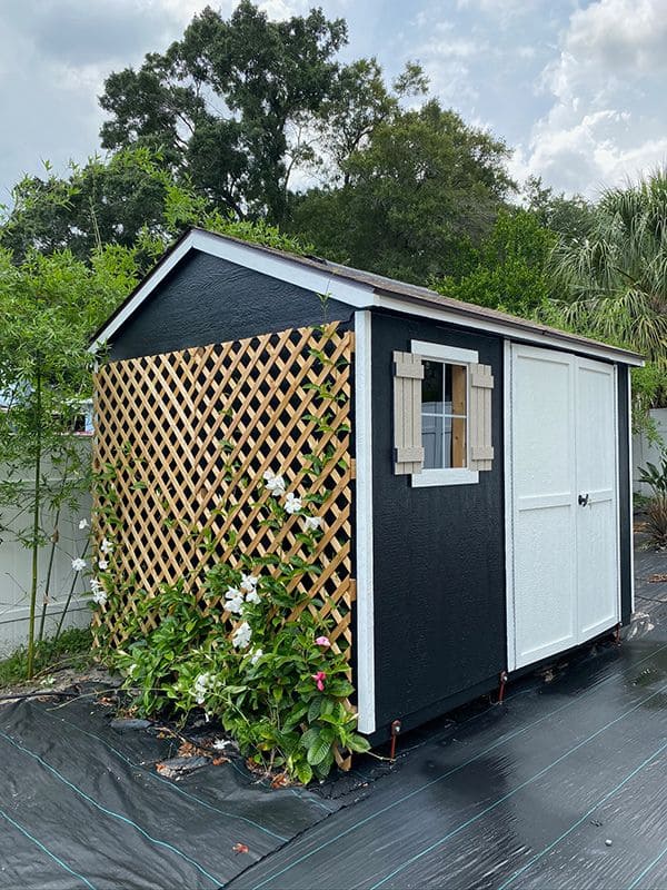 Garden Shed with Trellis Accents