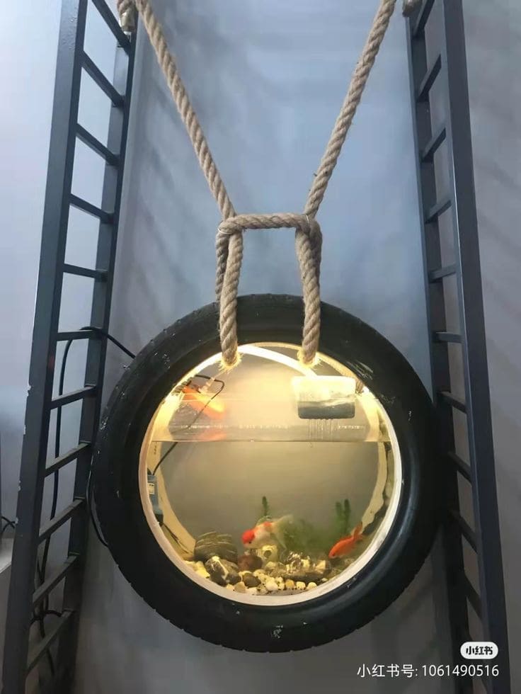 Hanging Tire Aquarium with Rustic Charm