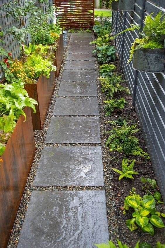 Modern Green Oasis with Raised Beds