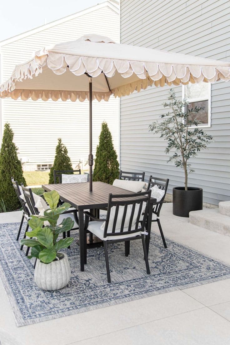 Sophisticated Outdoor Dining Under Chic Shade