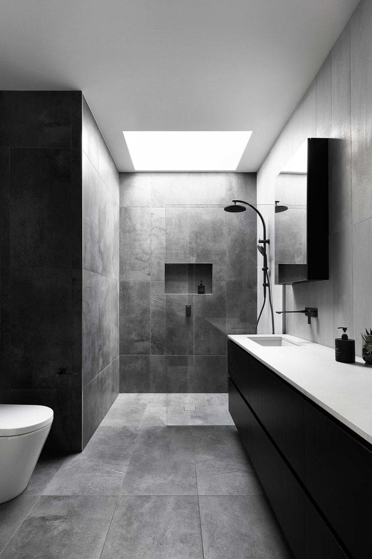 Minimalist Grey Bathroom with Skylight Drama