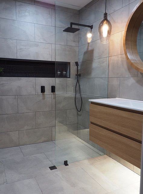 Sophisticated Grey Tiles with Wood Accents