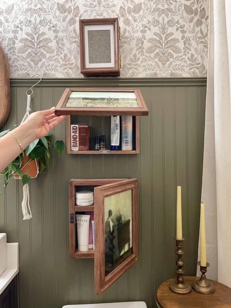 Hidden Bathroom Storage Behind Art Frames