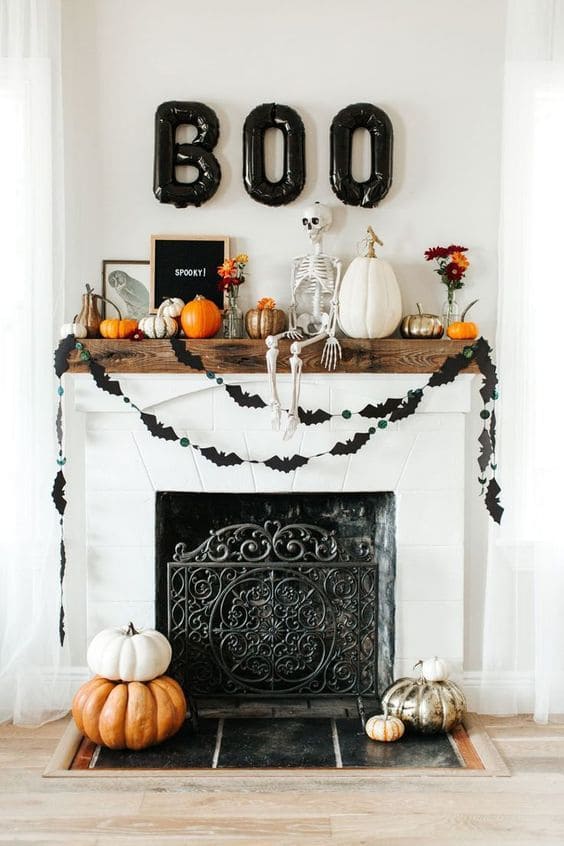 Playful Skeleton Mantel with a Cheerful BOO Twist