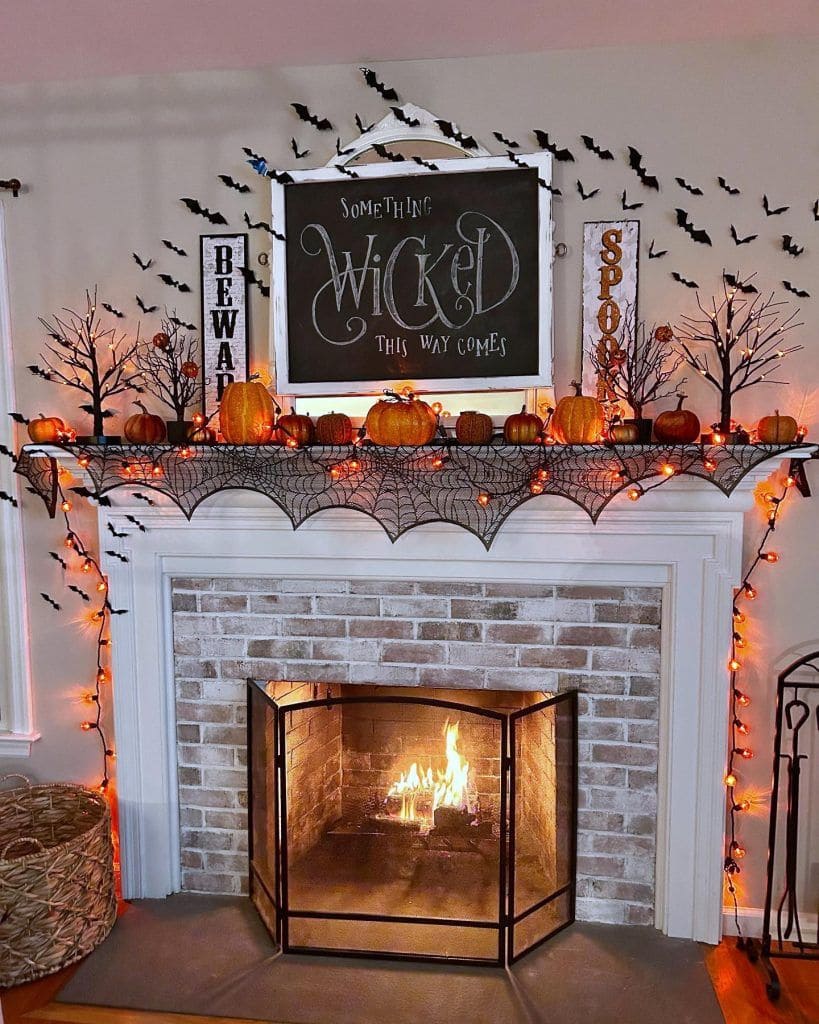 Wickedly Enchanting Mantel with Glowing Bat Swarm