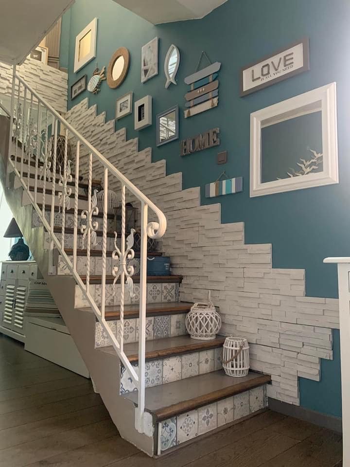 Coastal Gallery Staircase with Textured Stone Accent
