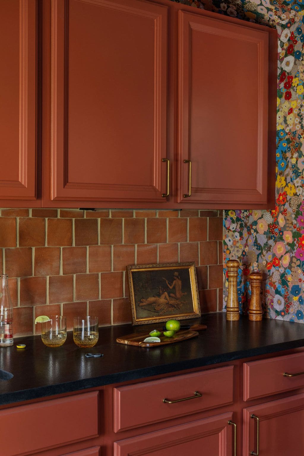 Bold Terracotta Kitchen with Artistic Flair