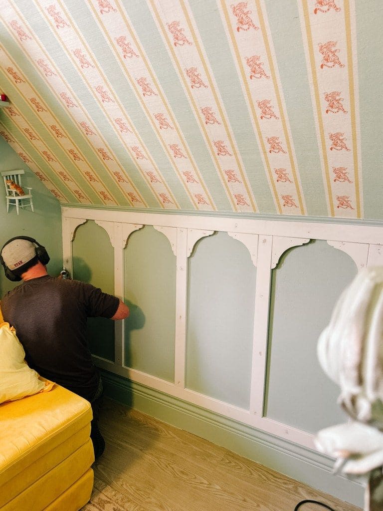 Charming Arched Wainscoting in Cozy Loft