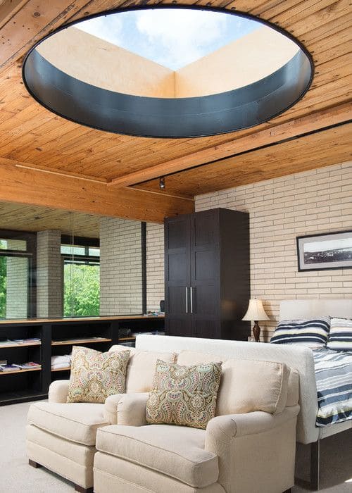 Circular Skylight in Cozy Bedroom Retreat
