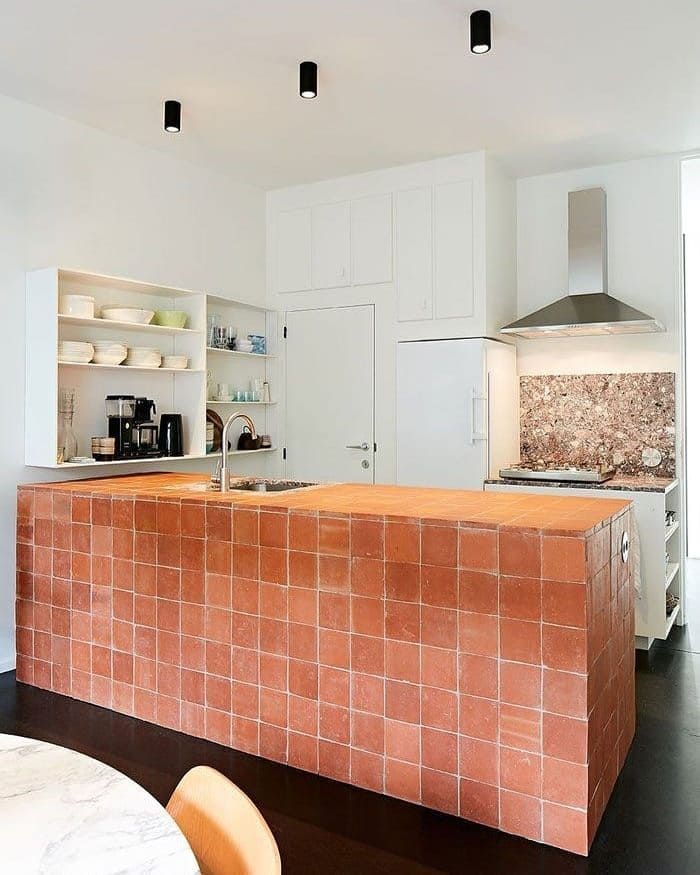 Modern Minimalism with Terracotta Tile Island