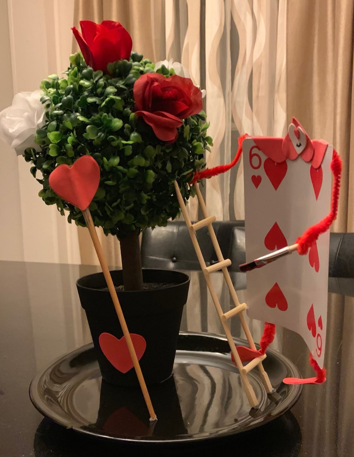 Painting the Roses Red Centerpiece