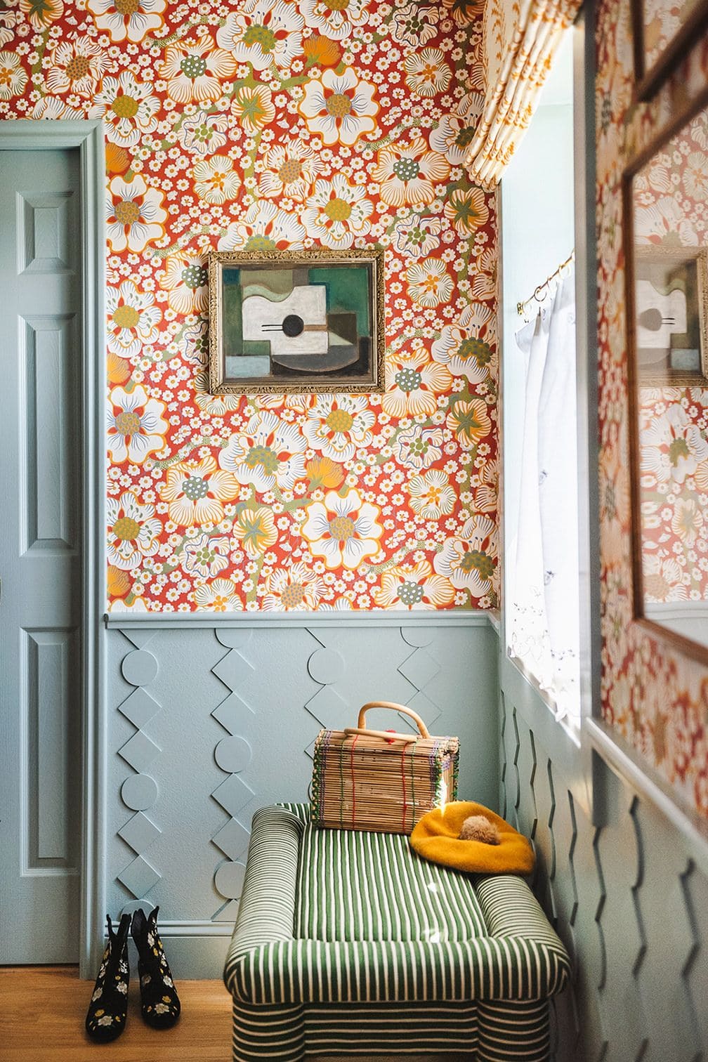 Playful Geometric Wainscoting with Bold Florals