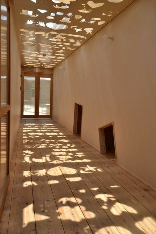 Whimsical Cutout Skylight Hallway