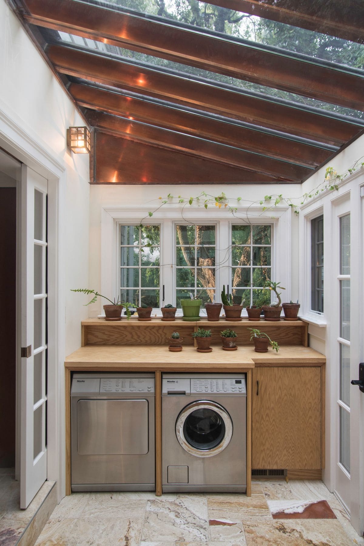 Sunlit Greenhouse Laundry Nook